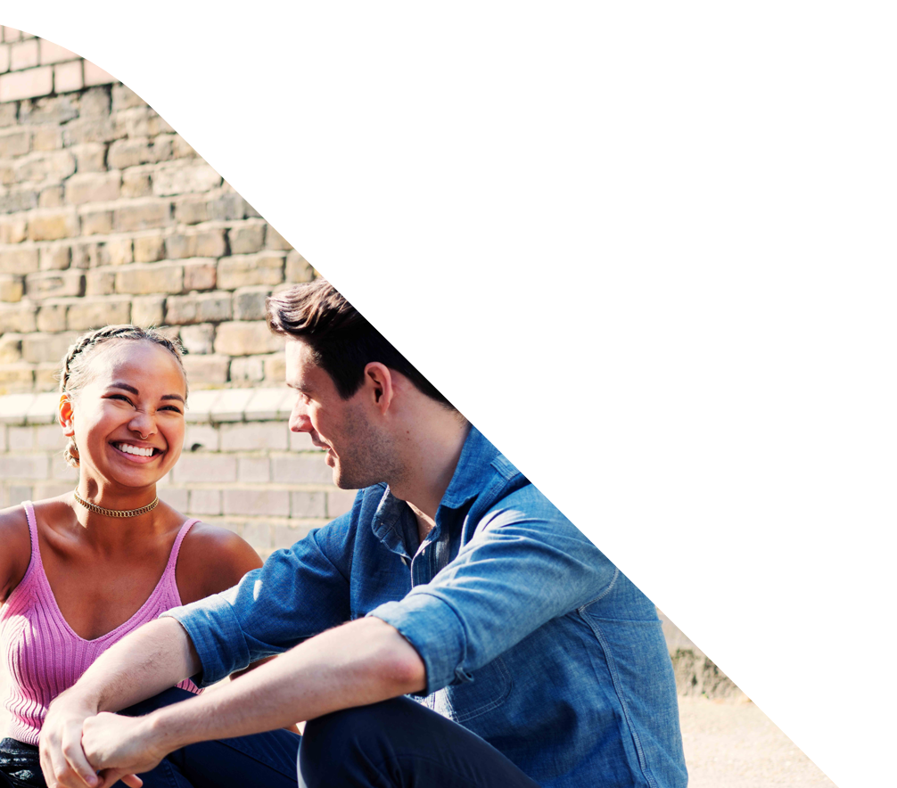Young lady and man smiling.