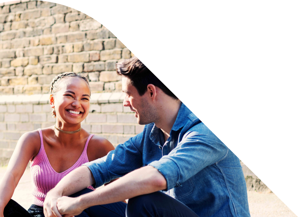 Young lady and man smiling.