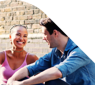 Young lady and man smiling.